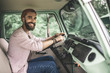© Yakobchuk Olena - Waist up happy hipster man driving retro van