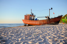 Fisherman Boats At Sunrise Time On The Beach