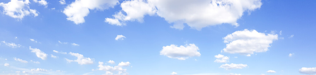 panorama of clear blue sky with white cloud background. clearing day and good weather in the morning
