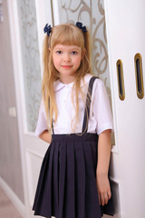 Wall Mural - cute cosplay little asian girl in school uniform