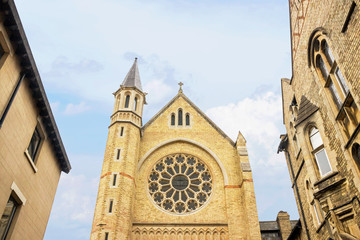 Exterior of St Aloysius Catholic Church with blue sky in Oxford town