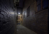 Fototapeta Uliczki - Spooky alley at night