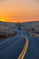 Wall Mural - Country road at sunrise