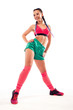 © Admiral - Smiling young female dancing zumba on white background. Full length studio shot.