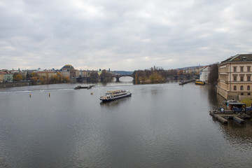 Wall Mural -  Cityscape of the Czech capital Prague and the Vltava river. View of Charles Bridge and Prague Castle on Christmas Eve.