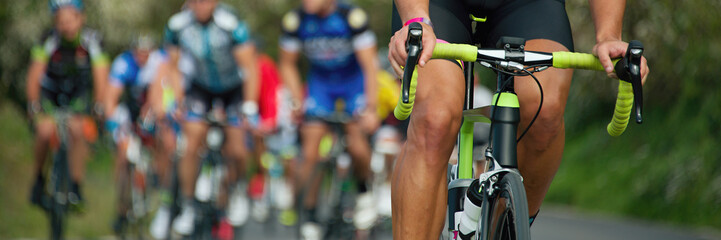 Wall Mural - Cycling competition, cyclist athletes riding a race