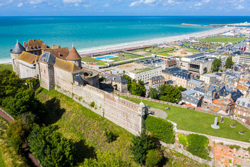 Aerial view of Dieppe town, the fishing port on the English Channel, at the mouth of Arques river. On a clifftop overlooking pebbly Dieppe Beach is the centuries-old Chateau de Dieppe, now the museum