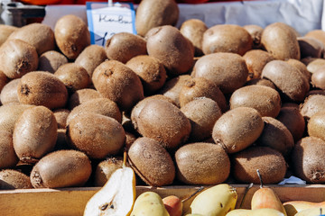 Wall Mural - Fresh kiwi on the market. Lots of kiwi close-UPS.