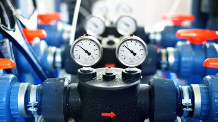 Wall Mural - industrial barometers and water pipes in boiler room