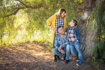 Wall Mural - Mixed Race Family Portrait Outdoors