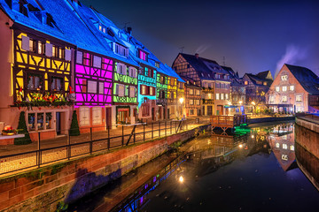 Wall Mural - Historical houses illuminated for Christmas in Colmar, Alsace, France