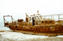 The Old Rusty Ship, On A Dump 