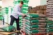 Customer buying fertilizer in store