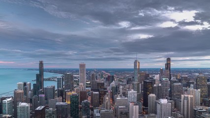 Wall Mural - a beautiful aerial skyline panoramic sunset day to night time lapse of downtown chicago with lake mi