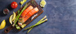 © freeskyline - Fresh raw salmon fillet steak with vegetables and ingredients prepared for cooking. Overhead horizontal image, room for text