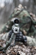 © Getmilitaryphotos - Sniper shooting from masked position on ground