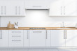 © ImageFlow - White kitchen countertops and cupboards