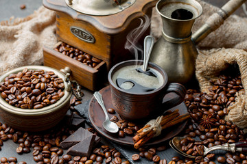 Black coffee on an old background in a cup