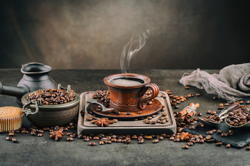 Black coffee on an old background in a cup