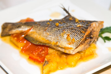 Wall Mural - stewed fish dish with potatoes and peppers