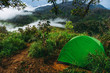 © Phongsak - Camping tent on the hill of mountain forest at 'LerGuaDa' or 'Ler Gwa Dor' Tak province, Thailand, Asia.