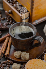 Black coffee on an old background in a cup