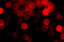Blurry Red Light Bokeh Glowing In The Dark