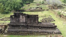 Aerial Drone Footage Above The Ruins Of The Wat Phu Champasak, An Unesco World Heritage, Lao PDR. Drone Is Moving Fowards