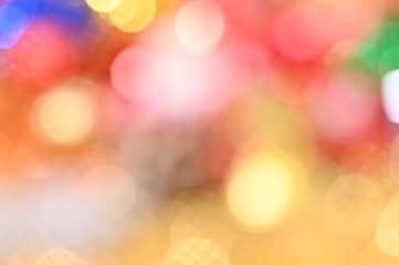 Wall Mural - christmas light colorful red yellow green blue defocused bokeh light decorative background