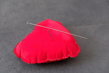 Wall Mural - red pincushion and big sewing needle,