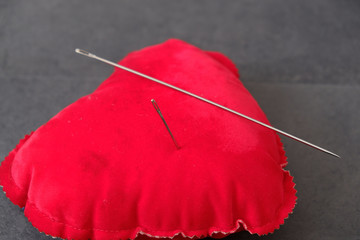 Wall Mural - red pincushion and big sewing needle,