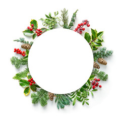 Wall Mural - flat lay composition with winter fir branches, cones, holly and blank card on white background