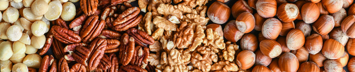 Wall Mural - Mix nut wide banner or panorama. Natural healthy food background made from different kinds of nuts.