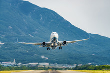 Sunny View Of Airplane Taking Off From Airport Of Tivat, Montenegro.