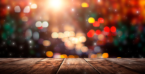 Wall Mural - wooden table, blurred bokeh background background. neon light, night view, close-up. the general bac