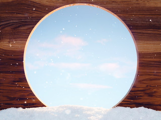 Wall Mural - wooden board with a round hole in the snow on a winter sunny day. background image with copy space