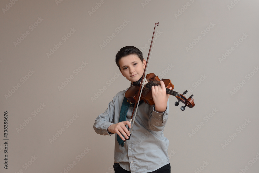Boy playing viola wearing shirt and tie - obrazy, fototapety, plakaty 