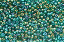 Turquoise Background Of Glass Glittering Beads  