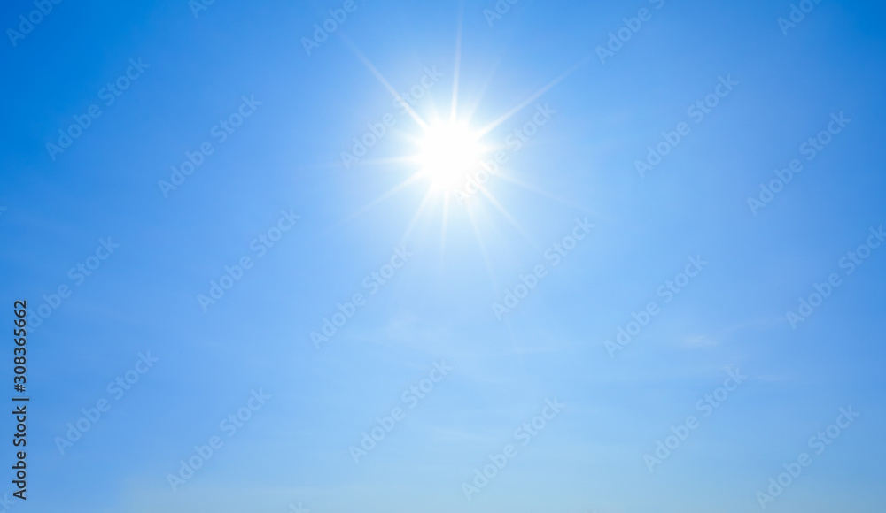 Shining sun with rays and clear blue sky - obrazy, fototapety, plakaty 