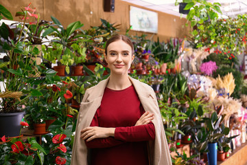 Wall Mural - Portrait of female business owner in flower shop