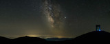 Fototapeta  - Night astro view of Arch of freedom monument  with milky way on the background near Troyan sity, Bulgaria.
