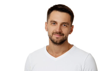 close-up portrait of smiling handsome bearded man in white shirt looking at camera isolated on white