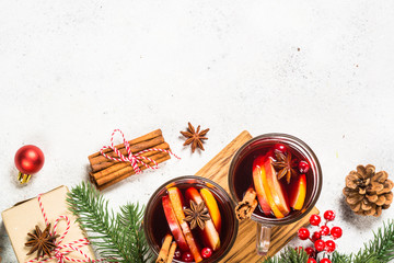 Wall Mural - Mulled wine with christmas decorations on white.