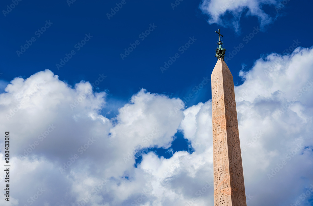 Foto de Stock Ancient Lateran Obelisk among clouds, built during ...