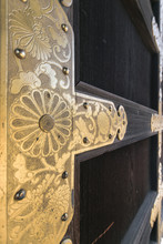 Decorative Golden Door Hinge Detail With Plant Motifs At The Higashi-Honganji Temple, Kyoto, Japan.