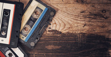 Old Audio Tape Compact Cassette On Wooden Background