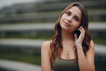 Portrait of young positive Woman with brown hair