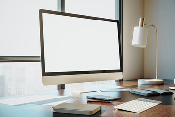 Wall Mural - designer desktop with empty white computer screen