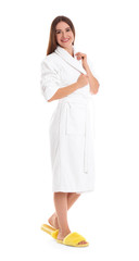 Wall Mural - Young woman in bathrobe on white background