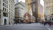 4K UHD Time Lapse Of Old State House And Transportation Of The Downtown Financial District. Tourist Attraction, Japan Tourism, Or American City Life Concept